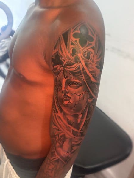 Black & Grey + Realism statue tattoo on Upper Arm by Tattoos_by_Dalton on TattMe