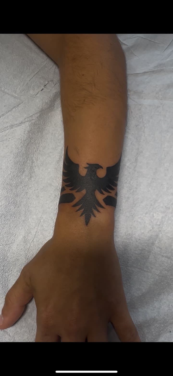 Black-work + Tribal bird tattoo on Wrist by Inkbyj on TattMe