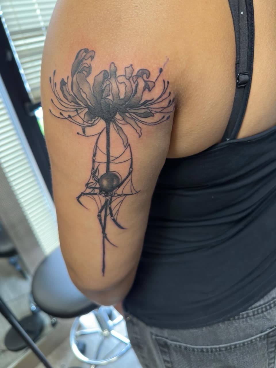Black & Grey + Fine Line flower tattoo on Upper Arm by Inkbyj on TattMe