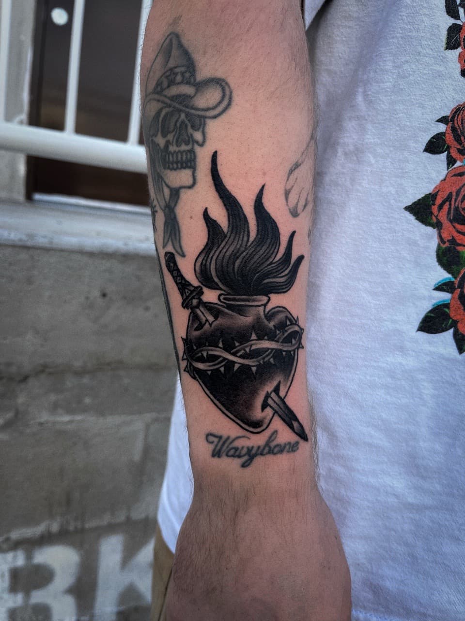 American Traditional + Black-work sacred heart tattoo on Forearm by high_hurdle_tattoo on TattMe