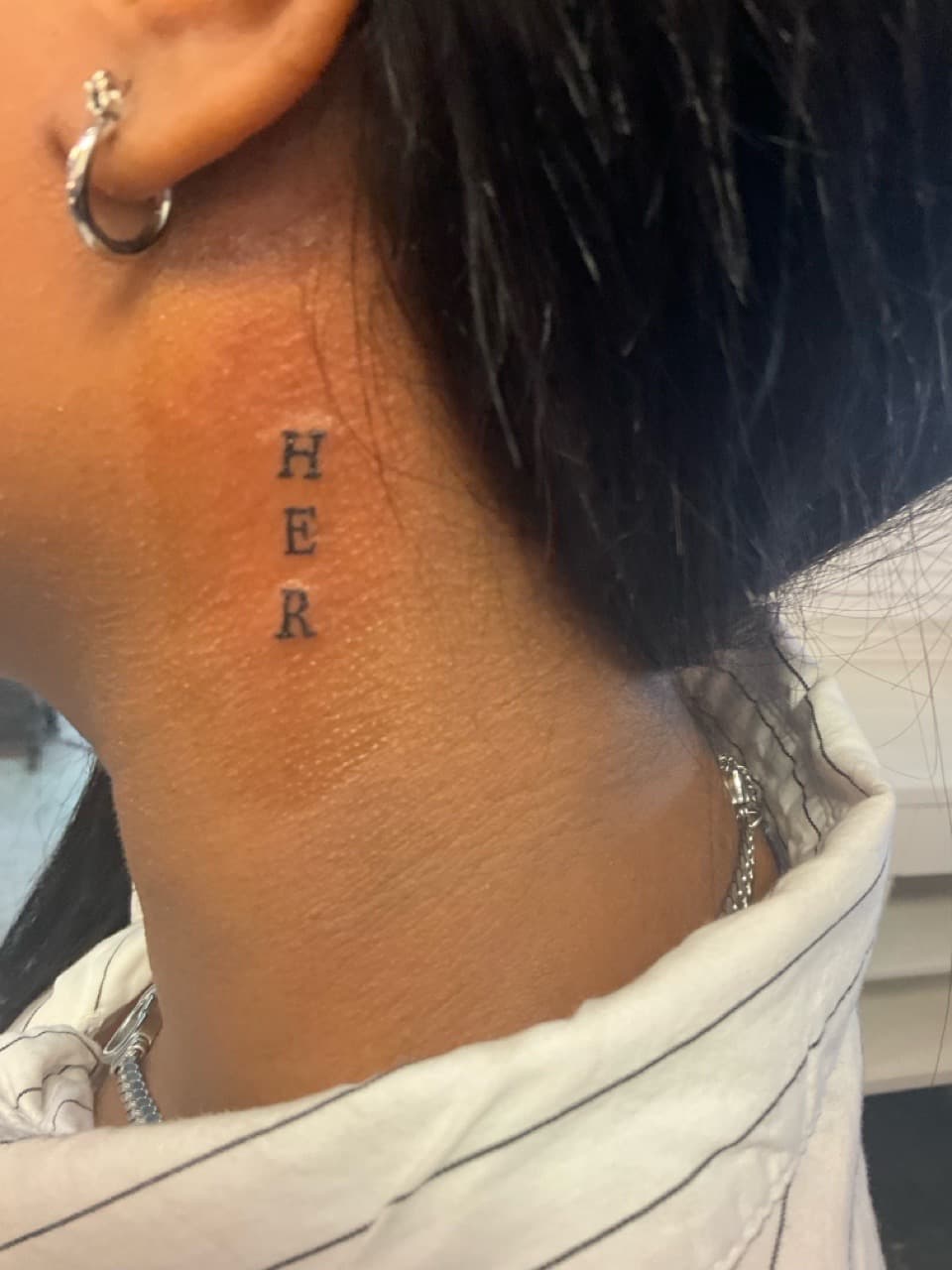 Lettering + Script word tattoo on Behind Ear by InkedByKellz on TattMe