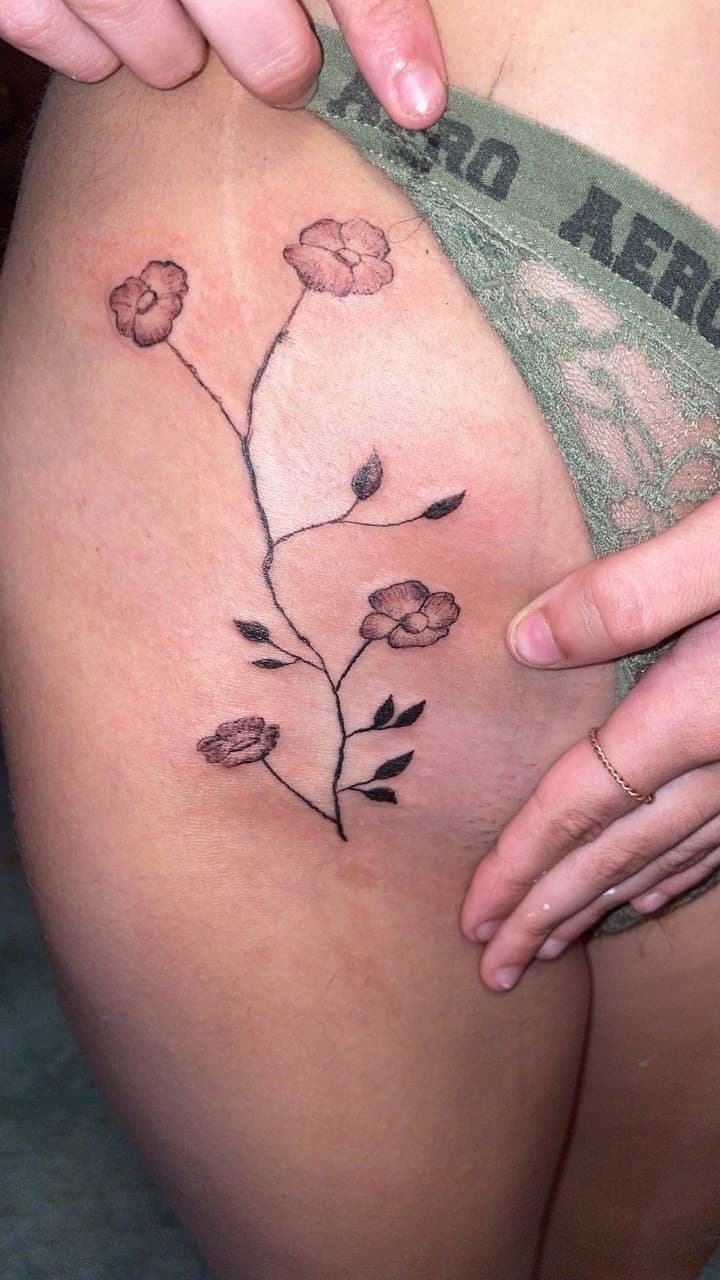 Fine Line + Floral flowers tattoo on Thigh by KiKisTattoos on TattMe