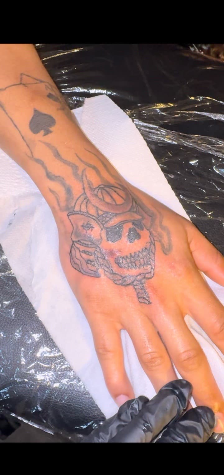 Black-work + Illustrative skull tattoo on Hand by TheTattooKennel on TattMe