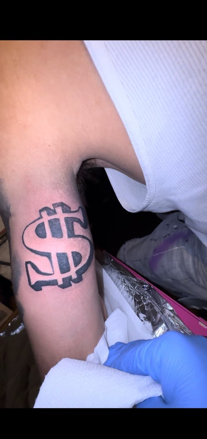 Black-work + Illustrative dollar sign tattoo on Upper Arm by TheTattooKennel on TattMe