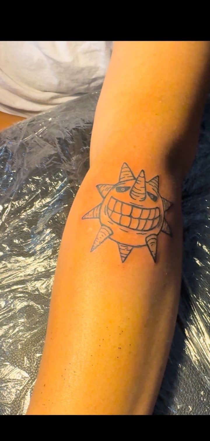 Line-work + Cartoon sun tattoo on Forearm by TheTattooKennel on TattMe