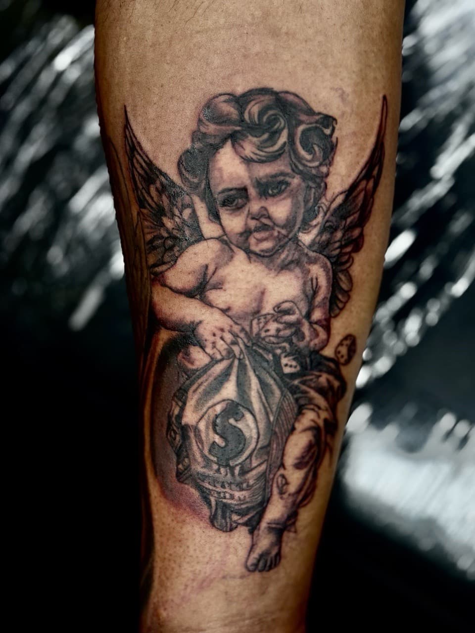 Black & Grey + Realism cherub tattoo on Forearm by Arttrigga on TattMe