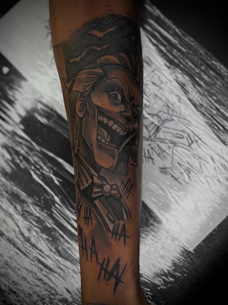 Black & Grey + Illustrative joker tattoo on Forearm by Arttrigga on TattMe