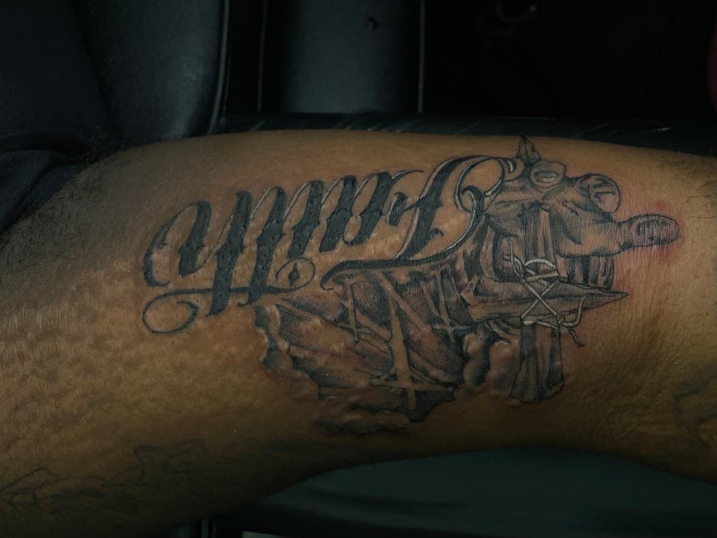 Black & Grey + Script faith tattoo on Upper Arm by Arttrigga on TattMe