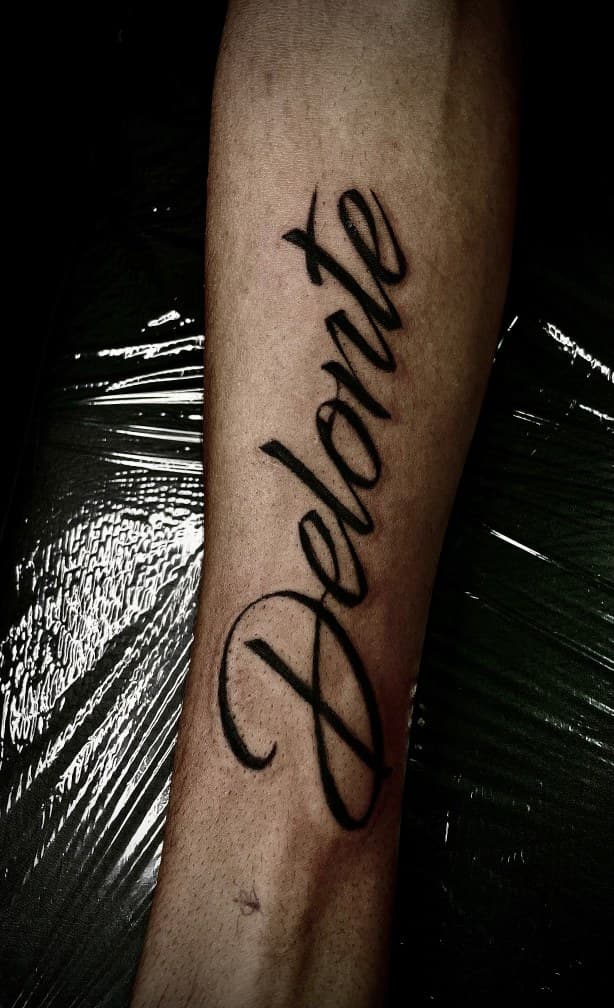 Script + Lettering name tattoo on Forearm by Arttrigga on TattMe