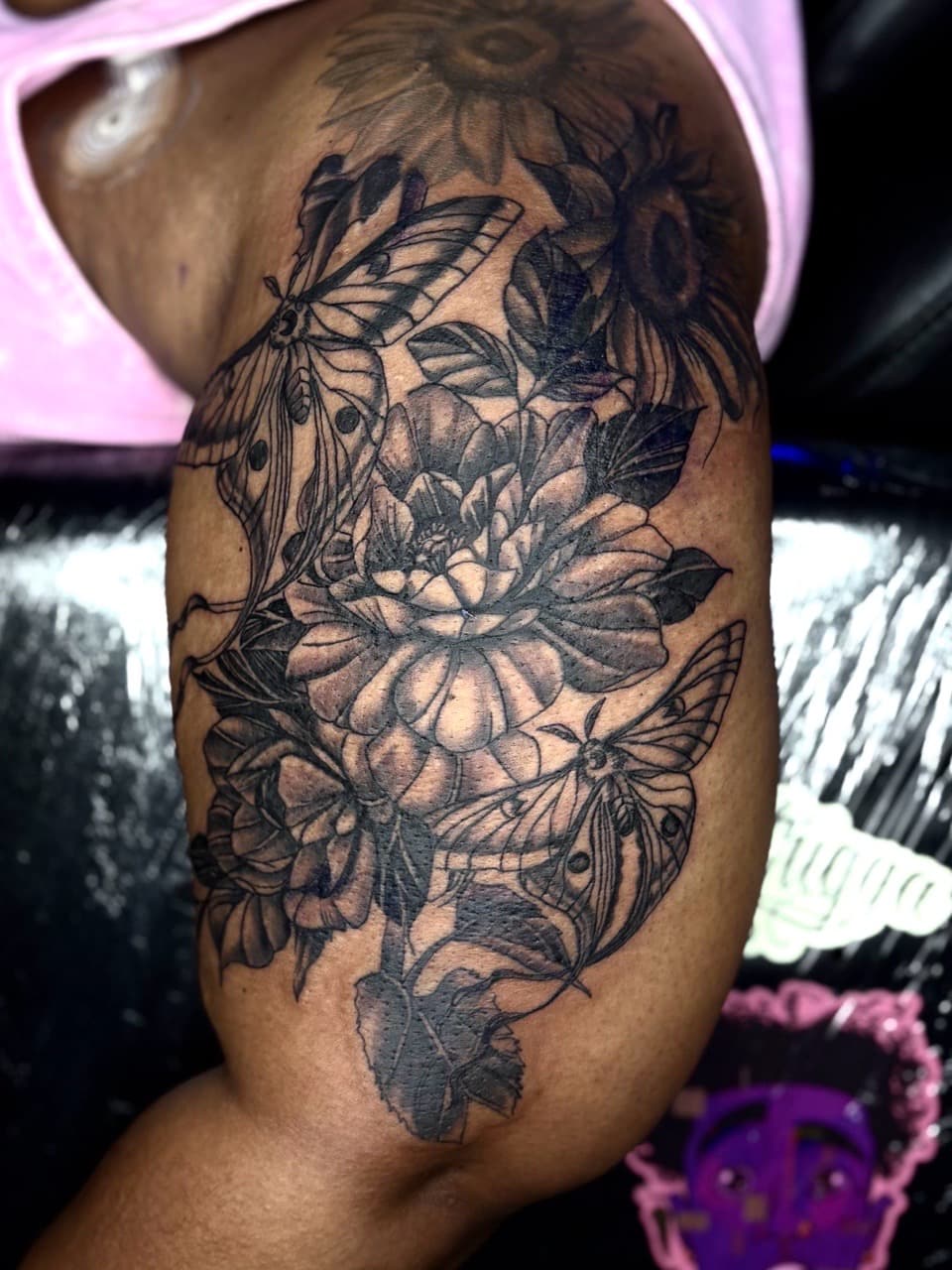 Black & Grey + Illustrative flowers tattoo on Upper Arm by Arttrigga on TattMe