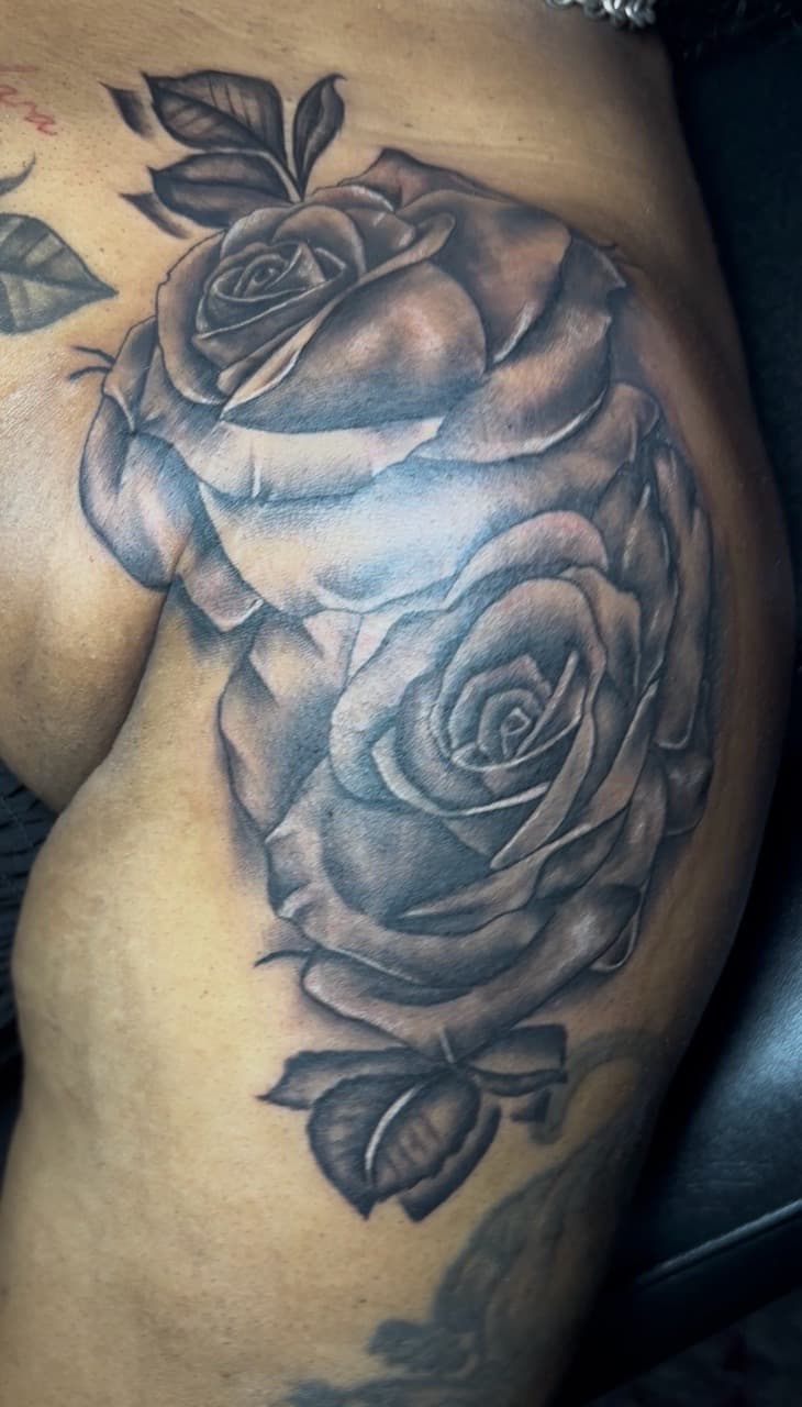 Black & Grey + Floral roses tattoo on Upper Arm by inkedbyshyllc on TattMe