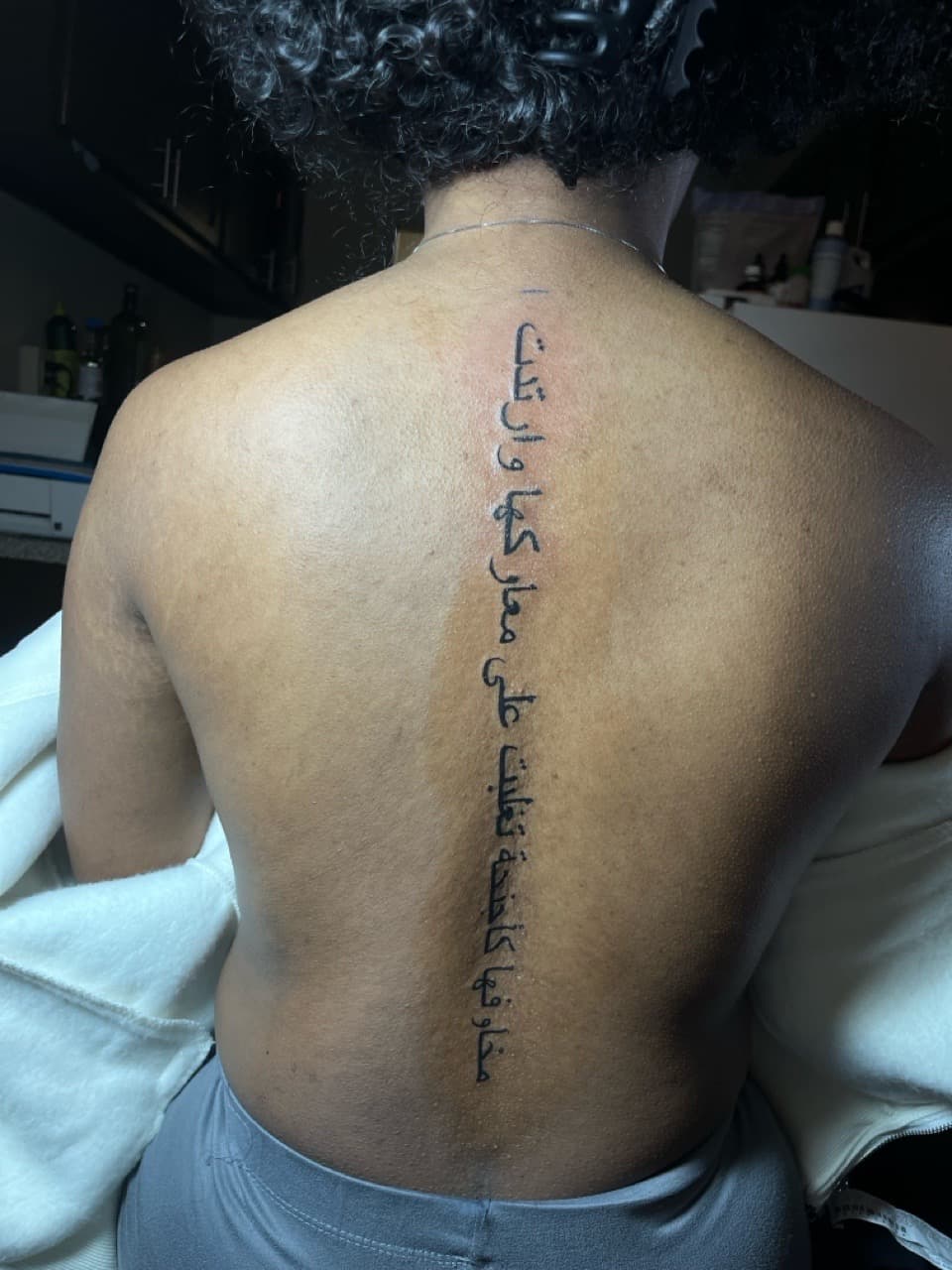 Lettering + Script arabic tattoo on Upper Back by inkedbyshyllc on TattMe