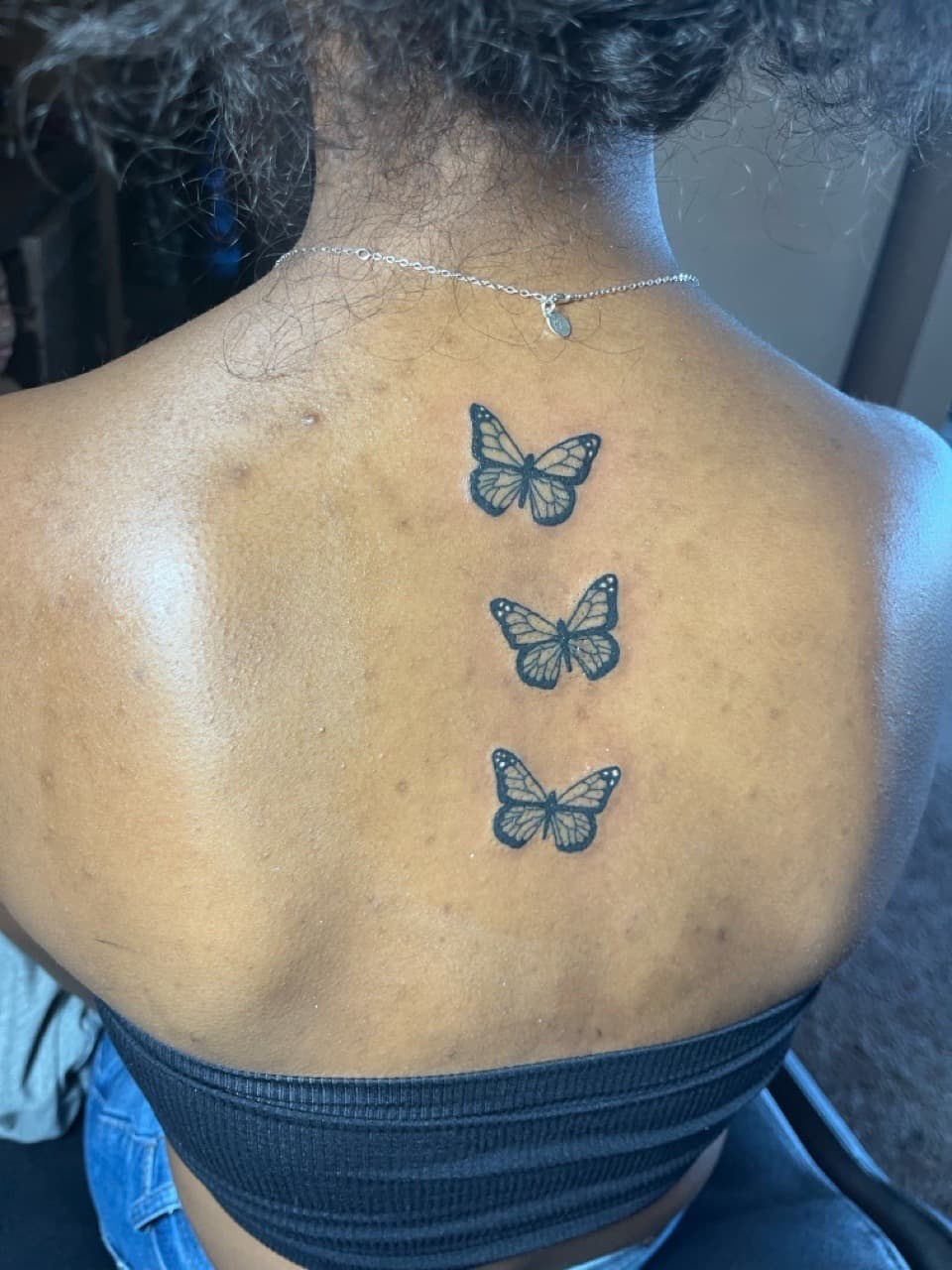Fine Line + Black-work butterflies tattoo on Upper Back by inkedbyshyllc on TattMe