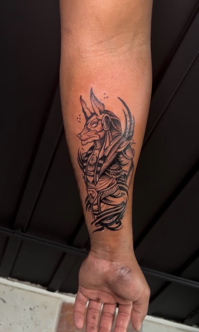 Black & Grey + Illustrative anubis tattoo on Forearm by inkedbyshyllc on TattMe