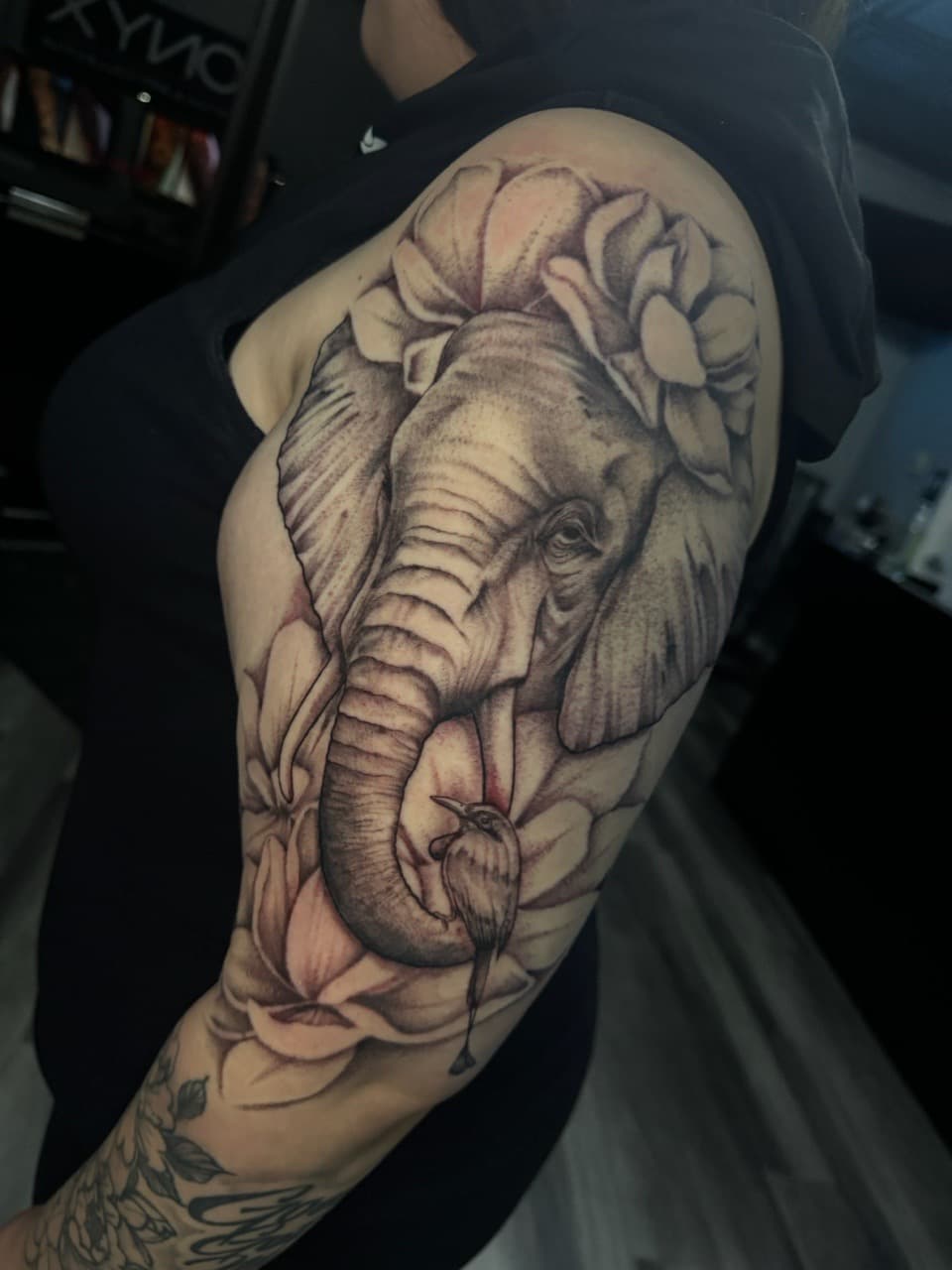 Black & Grey + Floral elephant tattoo on Upper Arm by Ink_by_Noble on TattMe