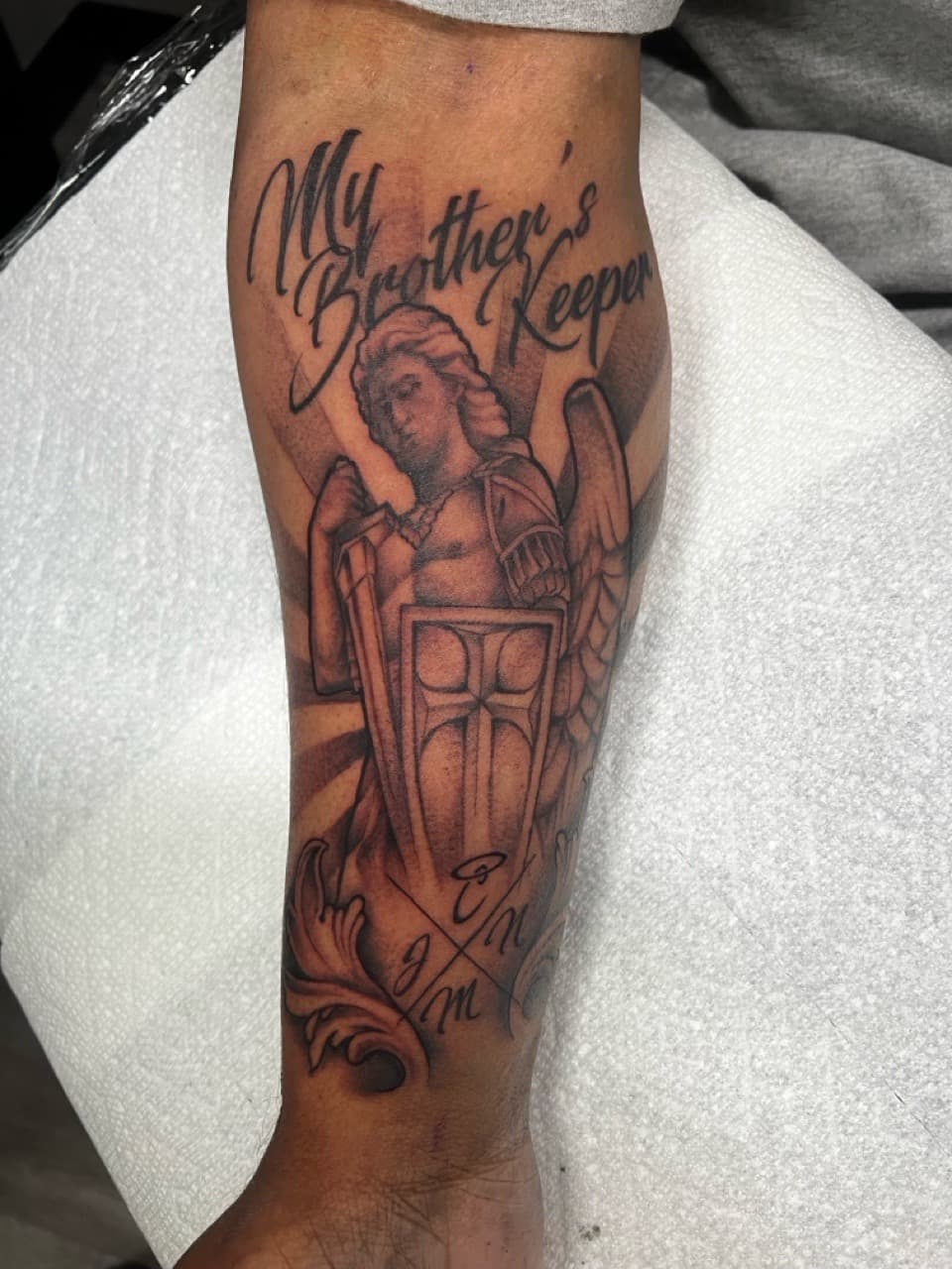 Black & Grey + Lettering angel tattoo on Forearm by Ink_by_Noble on TattMe