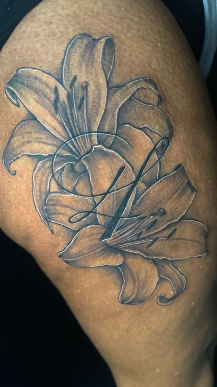 Black & Grey + Floral flowers tattoo on Upper Arm by Ink_by_Noble on TattMe