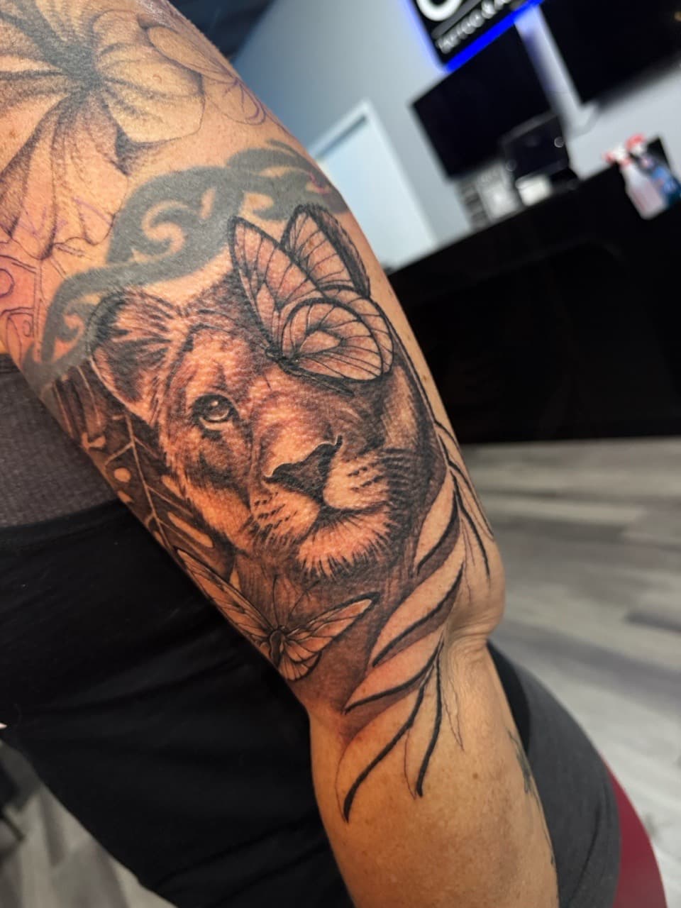 Black & Grey + Realism lioness tattoo on Upper Arm by Ink_by_Noble on TattMe