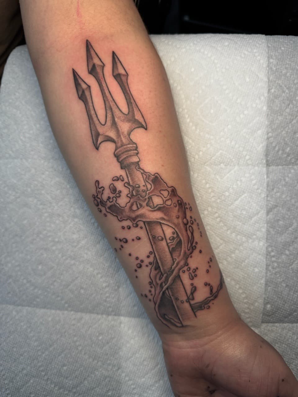 Black & Grey + Illustrative trident tattoo on Forearm by Ink_by_Noble on TattMe