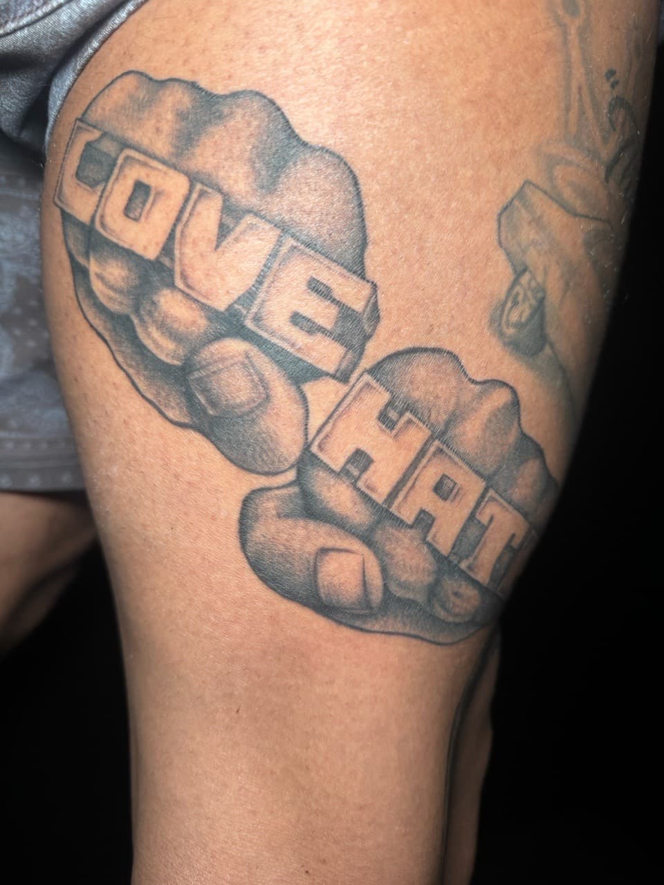 Black & Grey + Lettering fists tattoo on Thigh by Ink_by_Noble on TattMe