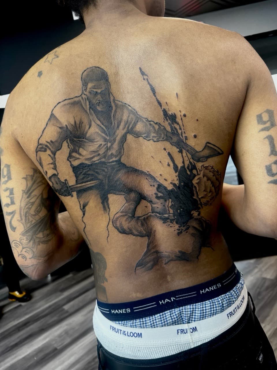 Black & Grey + Illustrative man tattoo on Upper Back by Ink_by_Noble on TattMe