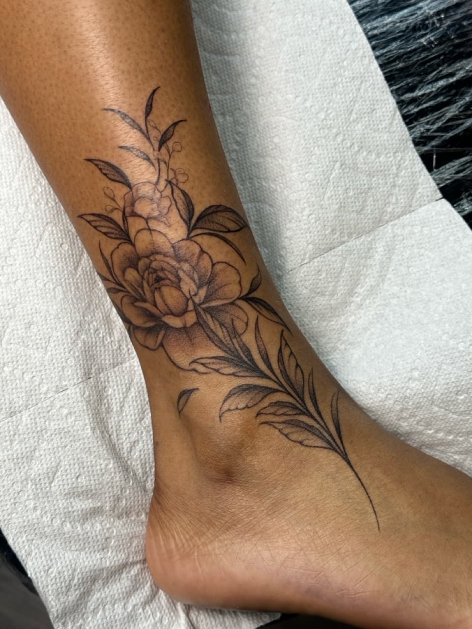 Floral + Fine Line flowers tattoo on Ankle by Ink_by_Noble on TattMe