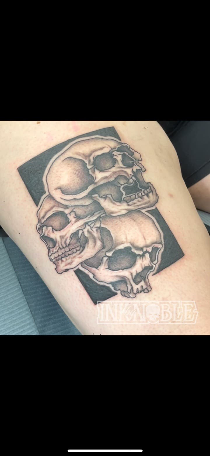 Black & Grey + Illustrative skulls tattoo on Thigh by Ink_by_Noble on TattMe