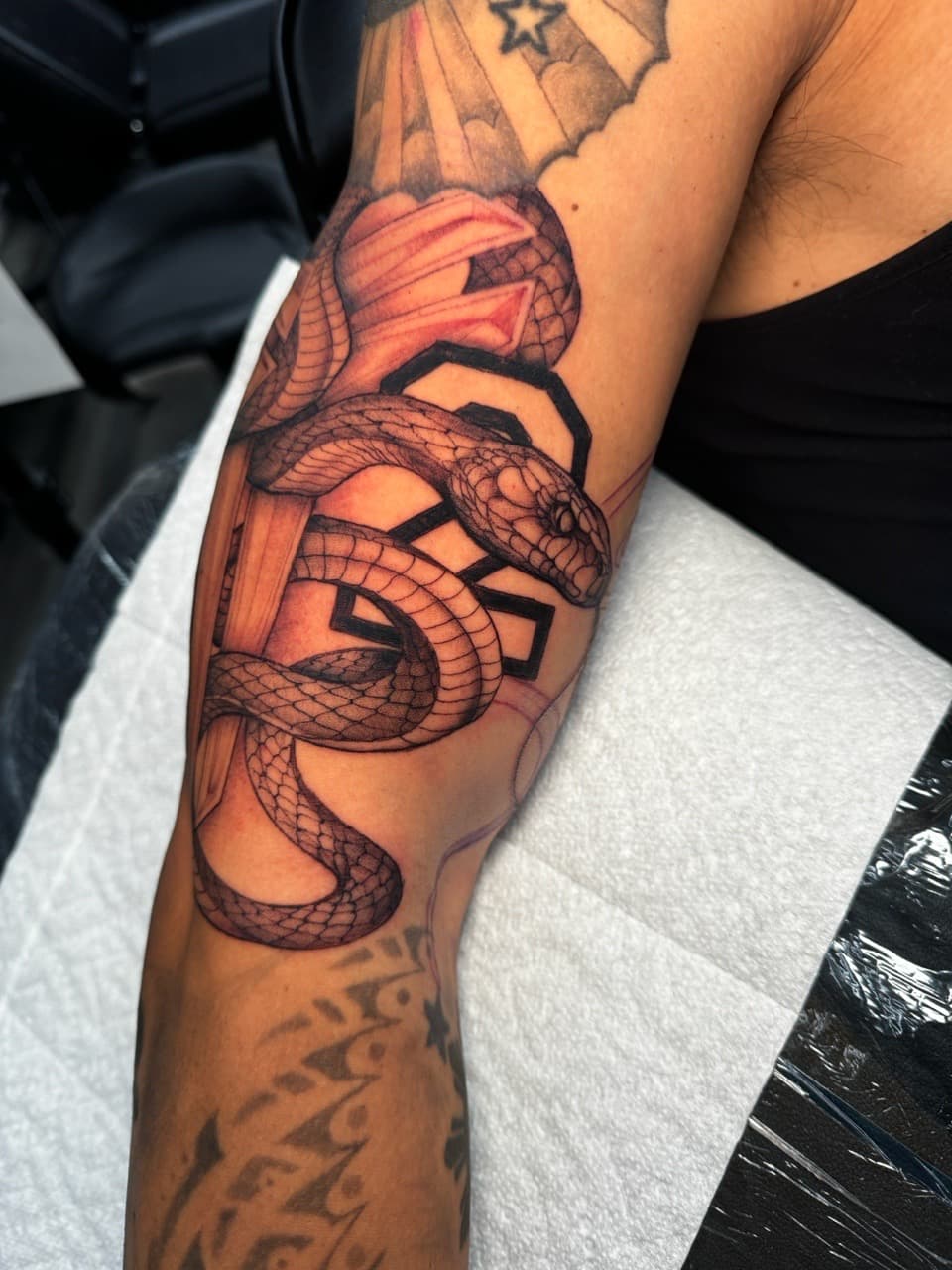 Fine Line + Black & Grey snake tattoo on Upper Arm by Ink_by_Noble on TattMe