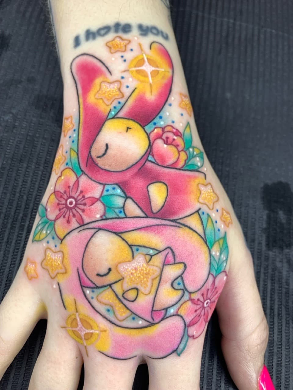 New School + Color bunnies tattoo on Hand by Mads_TwoTone_Roy on TattMe