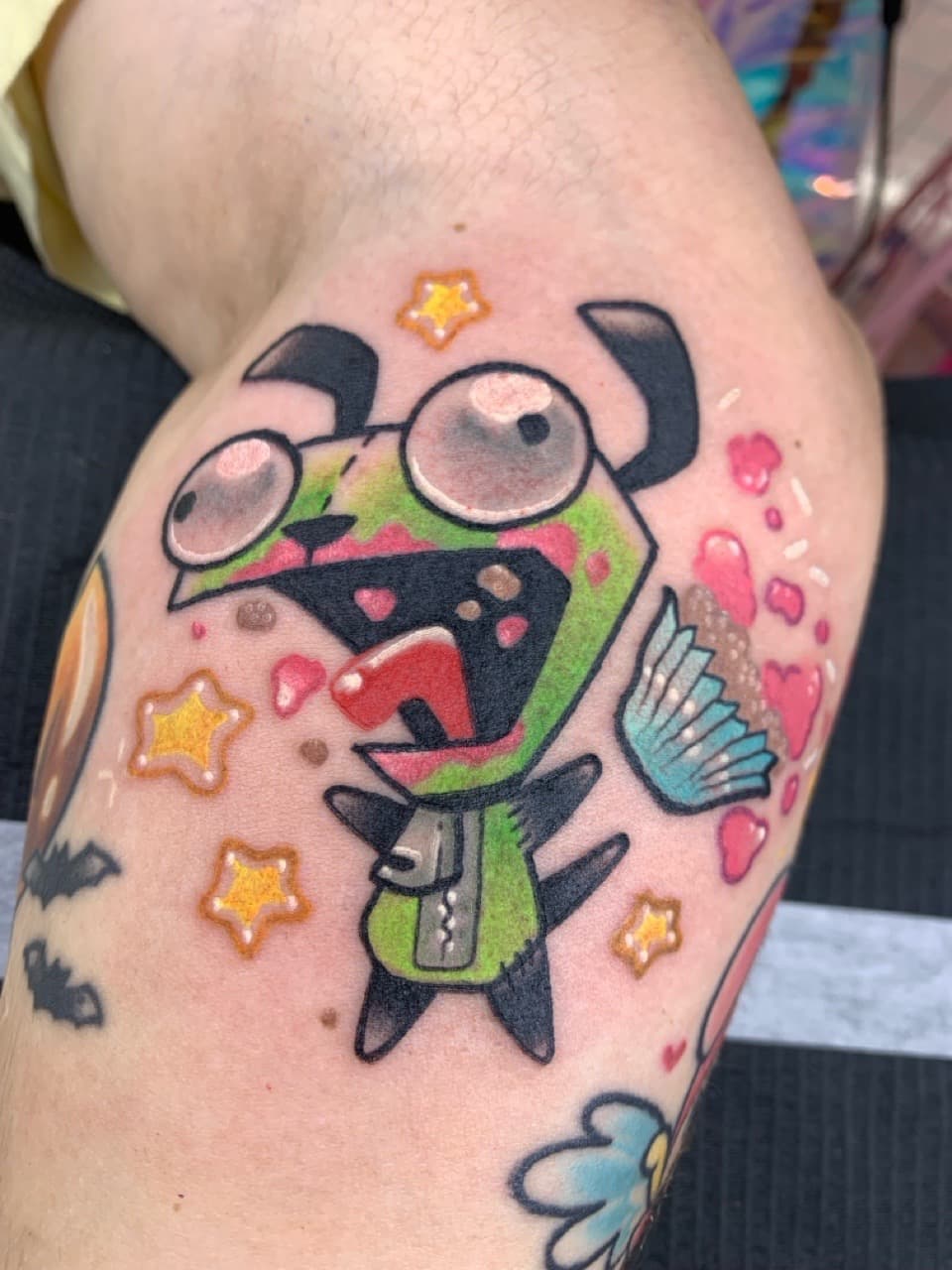 Cartoon + Color gir tattoo on Upper Arm by Mads_TwoTone_Roy on TattMe
