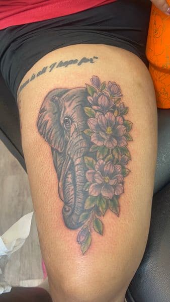Illustrative + Floral elephant tattoo on Thigh by Bakerboyink on TattMe