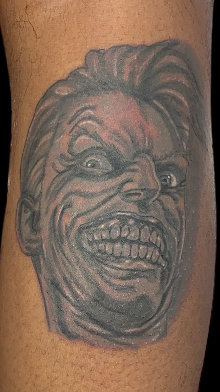 Portrait + Black & Grey grin tattoo on Calf by Bakerboyink on TattMe
