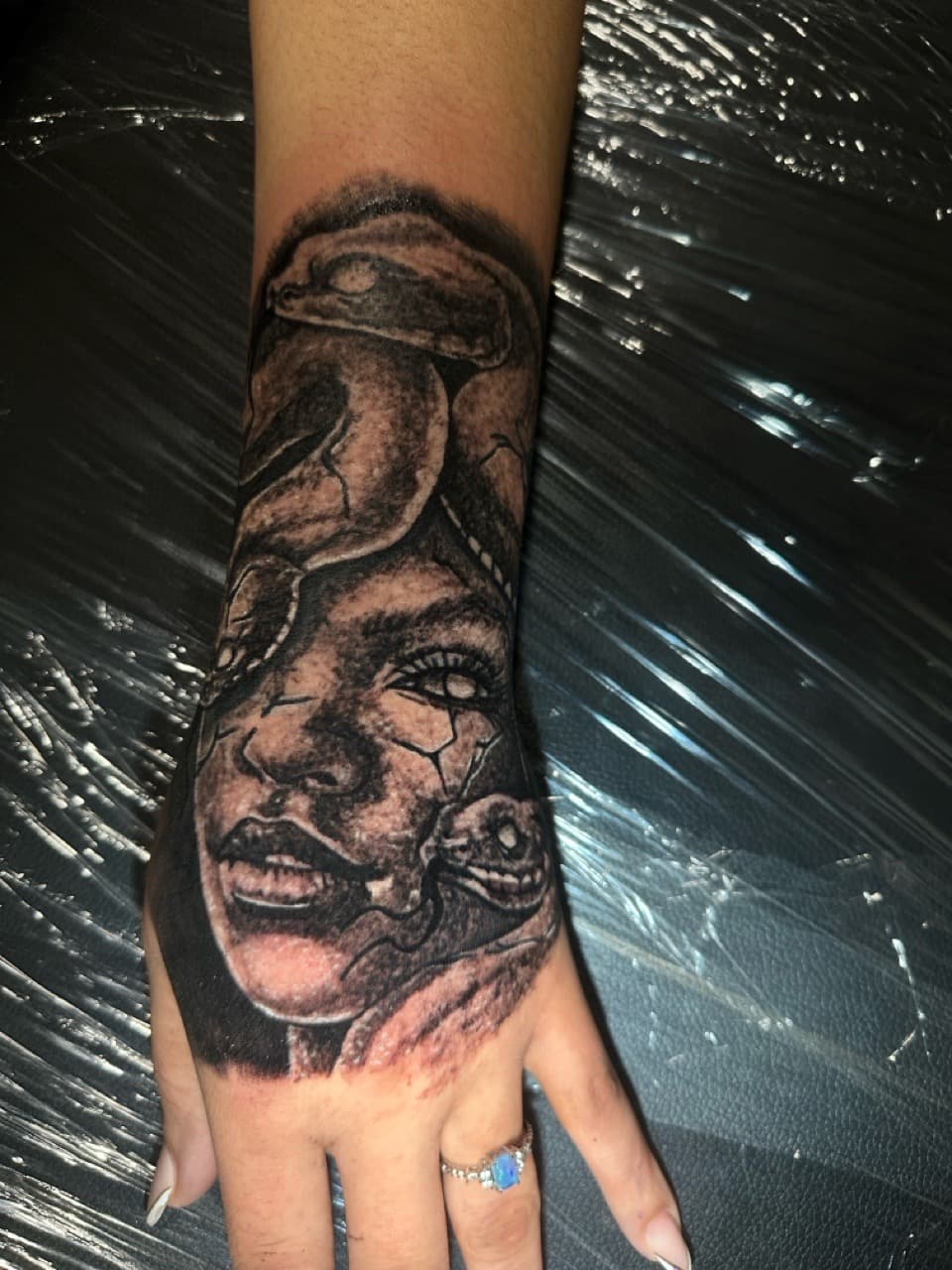 Realism + Black & Grey medusa tattoo on Hand by Spencetatts on TattMe