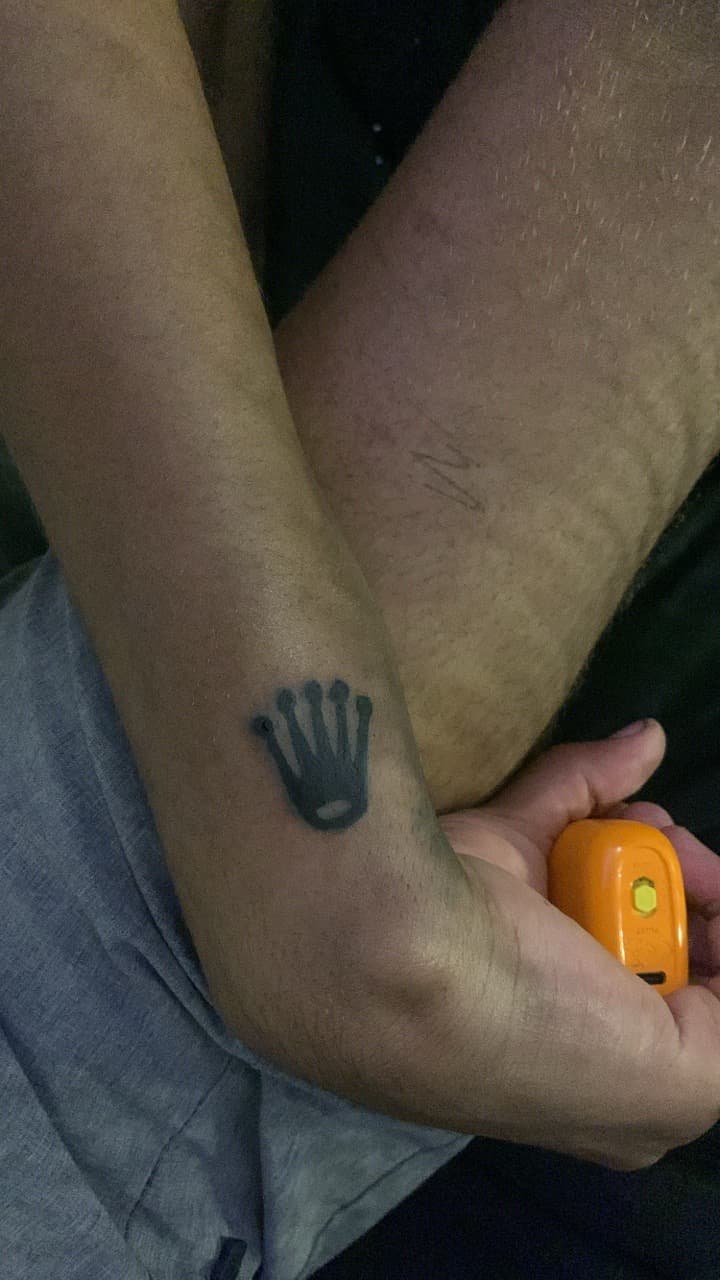Minimalist + Black-work crown tattoo on Wrist by TattedbyC3 on TattMe