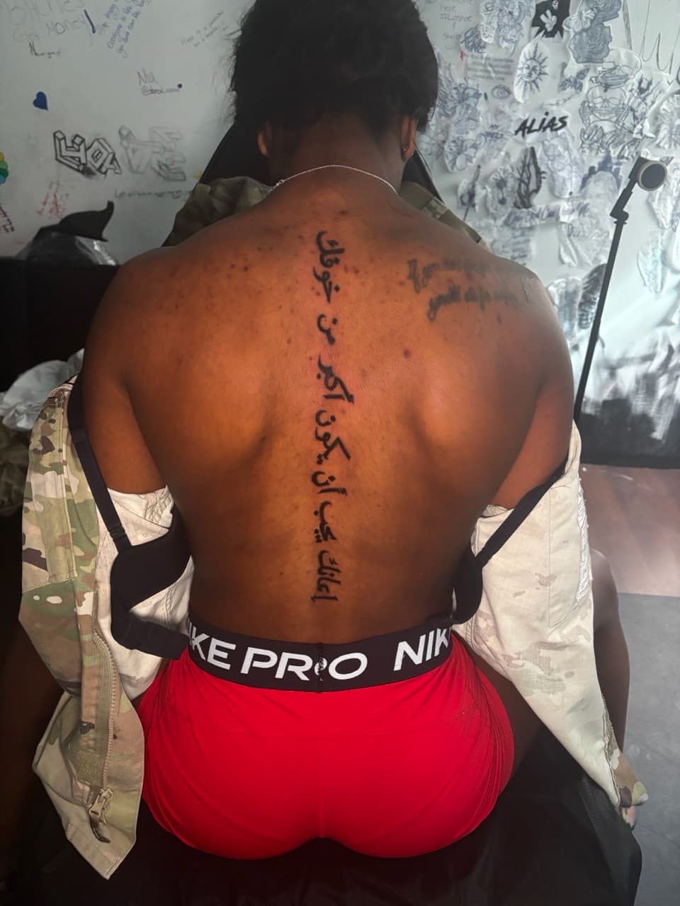 Lettering + Script arabic tattoo on Spine by Lottooink on TattMe