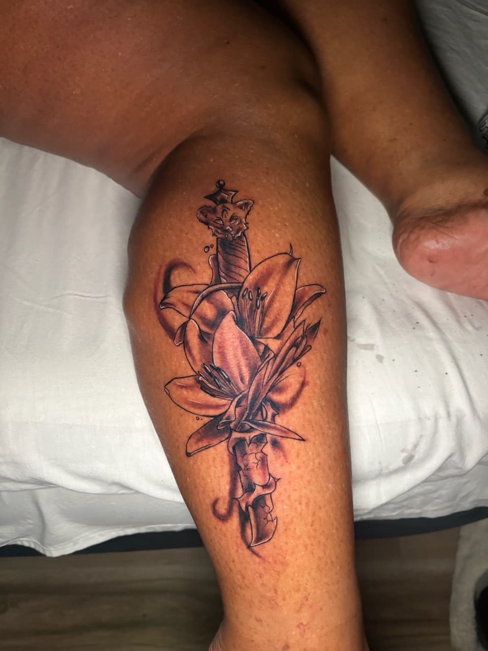 Black & Grey + Illustrative lily tattoo on Calf by Lottooink on TattMe