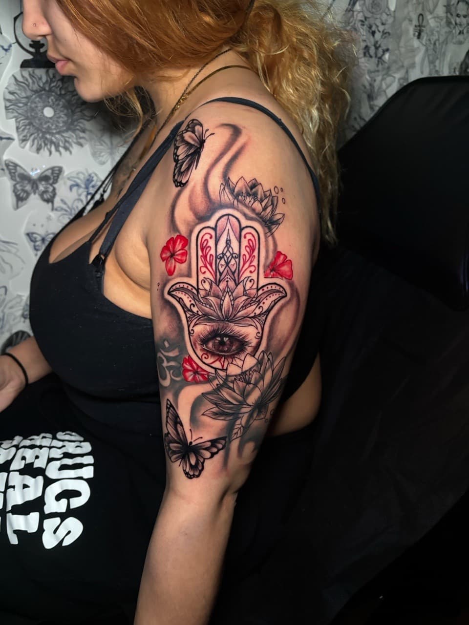 Black & Grey + Color hamsa hand tattoo on Upper Arm by Lottooink on TattMe