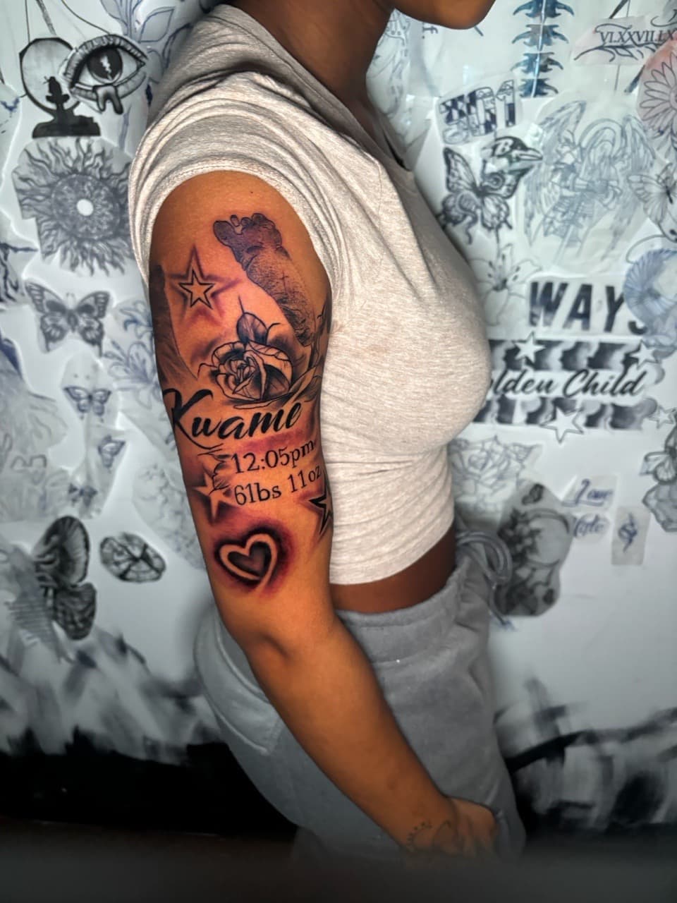 Black & Grey + Lettering baby footprint tattoo on Half Sleeve by Lottooink on TattMe