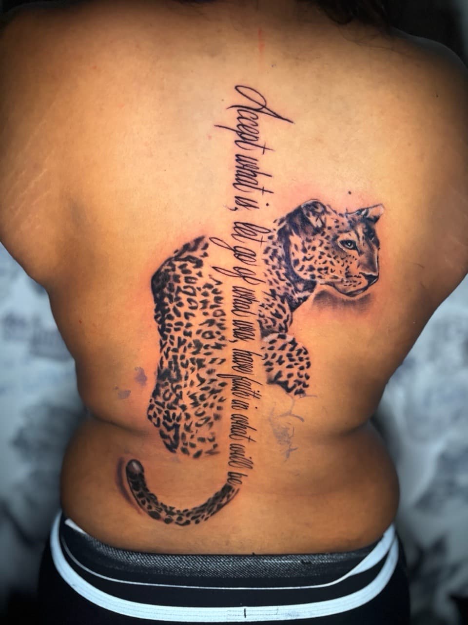 Black & Grey + Realism leopard tattoo on Spine by Lottooink on TattMe