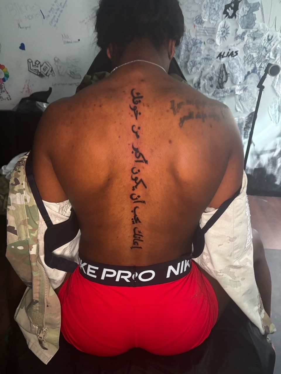 Lettering + Script arabic script tattoo on Spine by Lottooink on TattMe