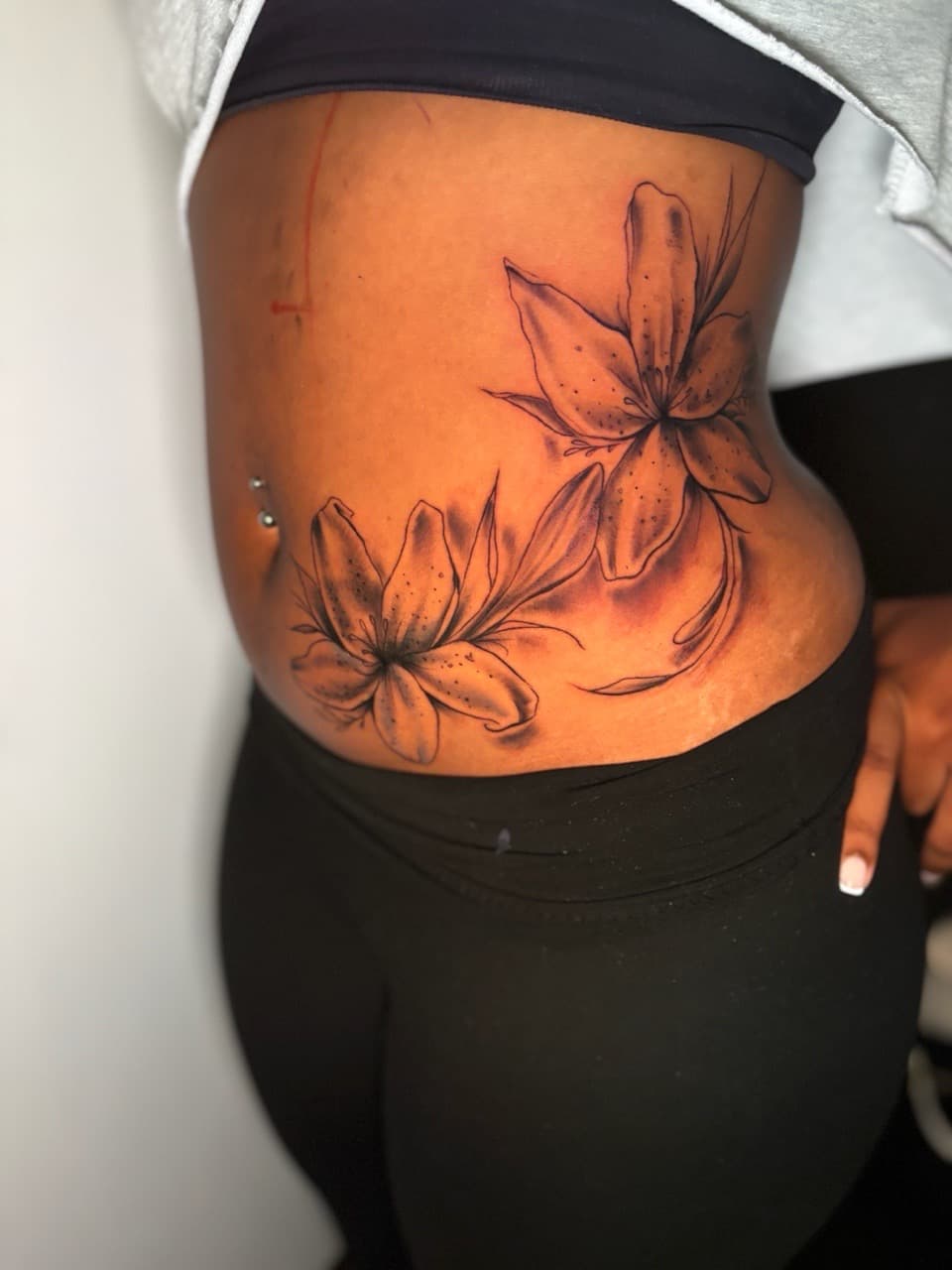 Floral + Black & Grey flowers tattoo on Stomach by Lottooink on TattMe