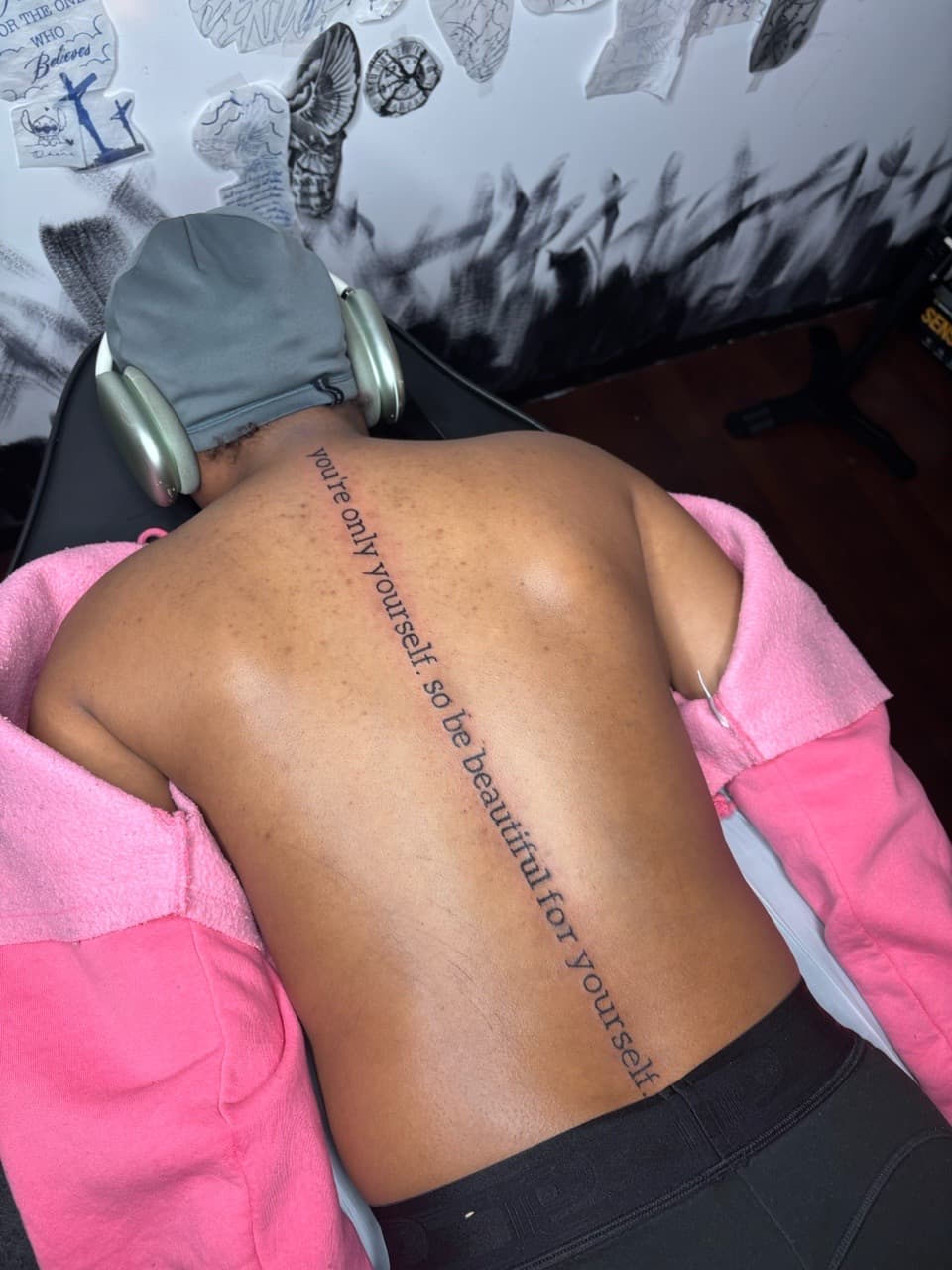 Lettering + Fine Line quote tattoo on Spine by Lottooink on TattMe