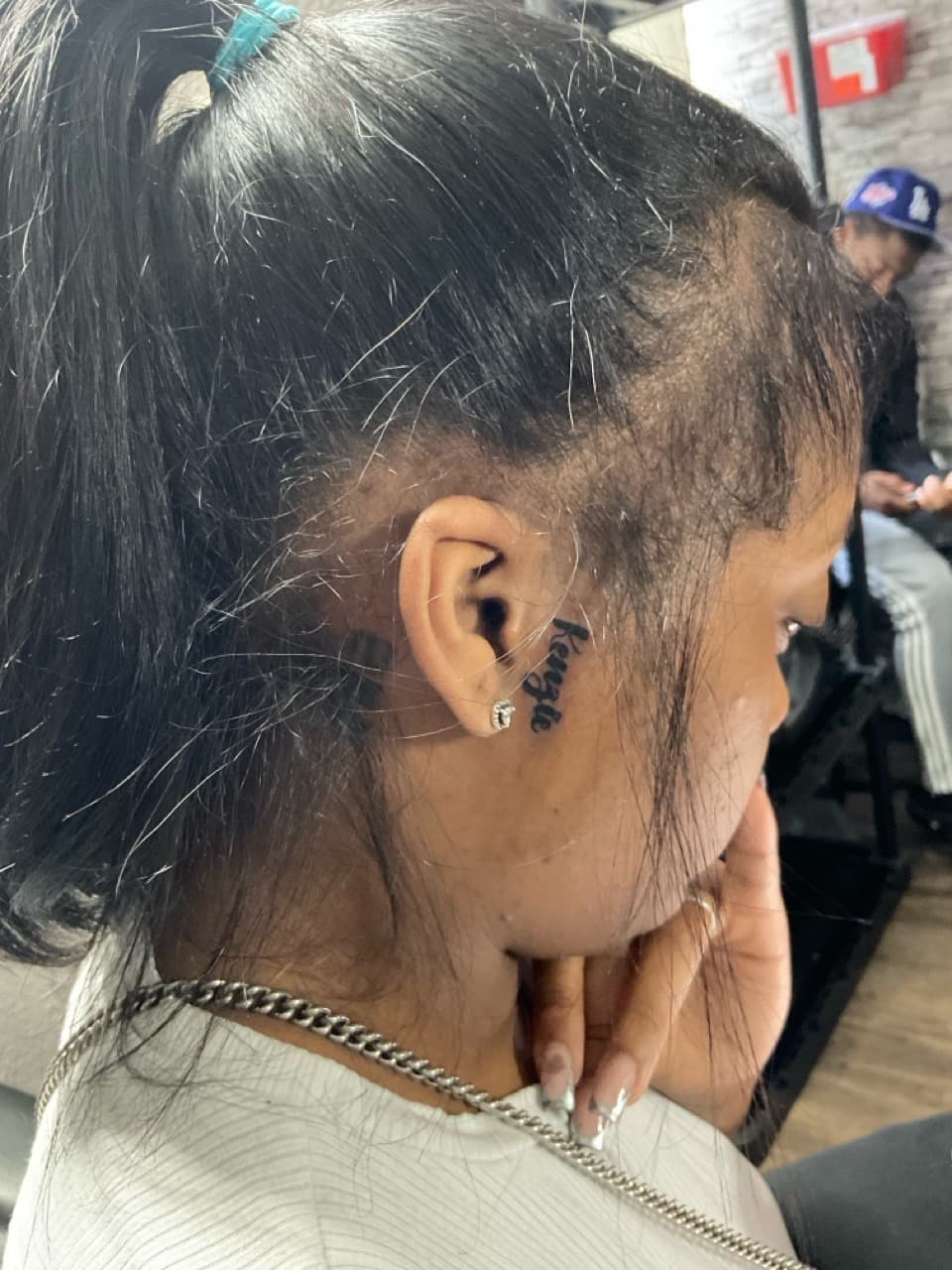 Lettering + Script woman tattoo on Face by PIKAISSO on TattMe