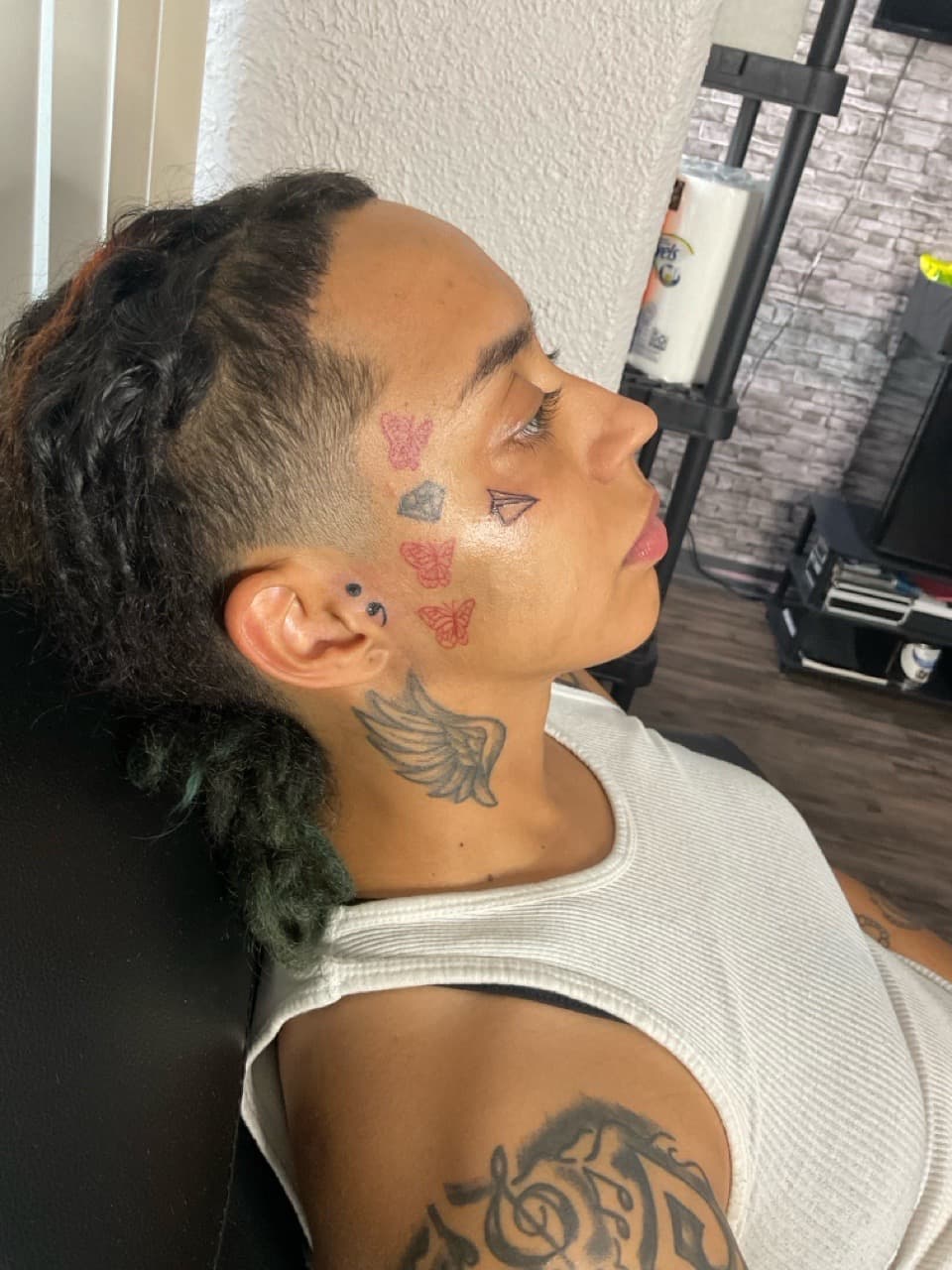 Fine Line + Minimalist butterflies tattoo on Face by PIKAISSO on TattMe