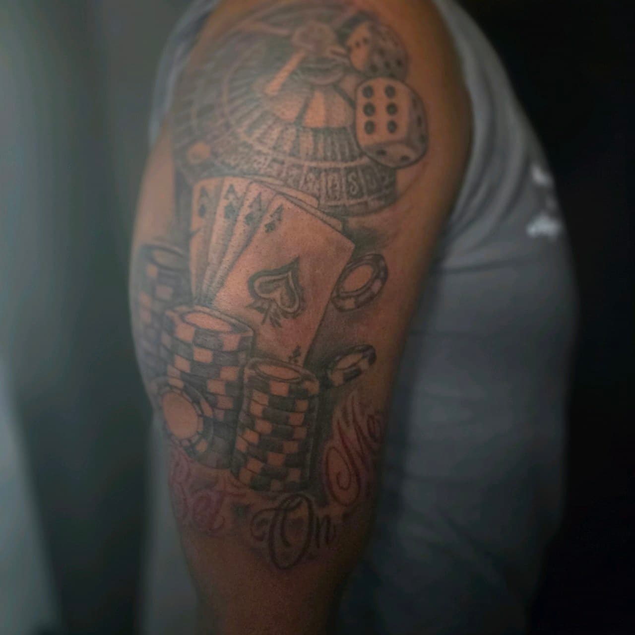 Black & Grey + Illustrative dice tattoo on Upper Arm by Mars_Inko on TattMe