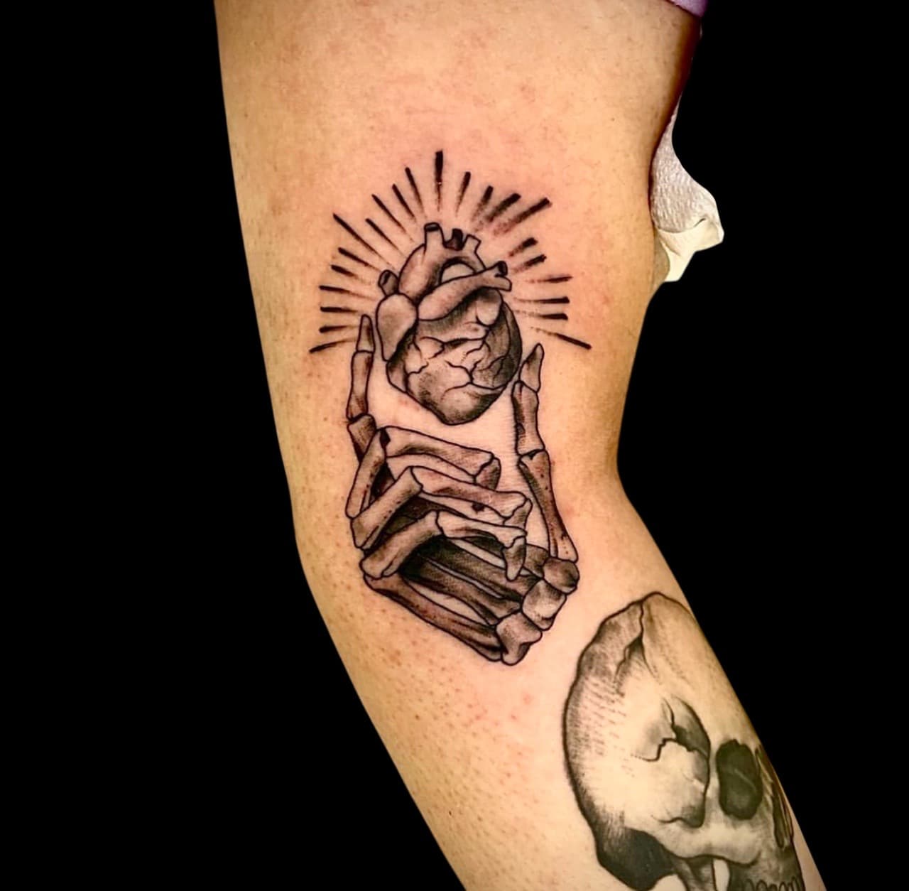 Black & Grey + Illustrative heart tattoo on Upper Arm by Surrender_Ink on TattMe