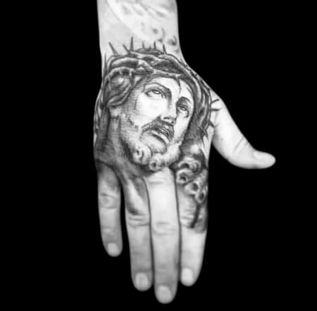 Black & Grey + Realism jesus tattoo on Hand by Surrender_Ink on TattMe