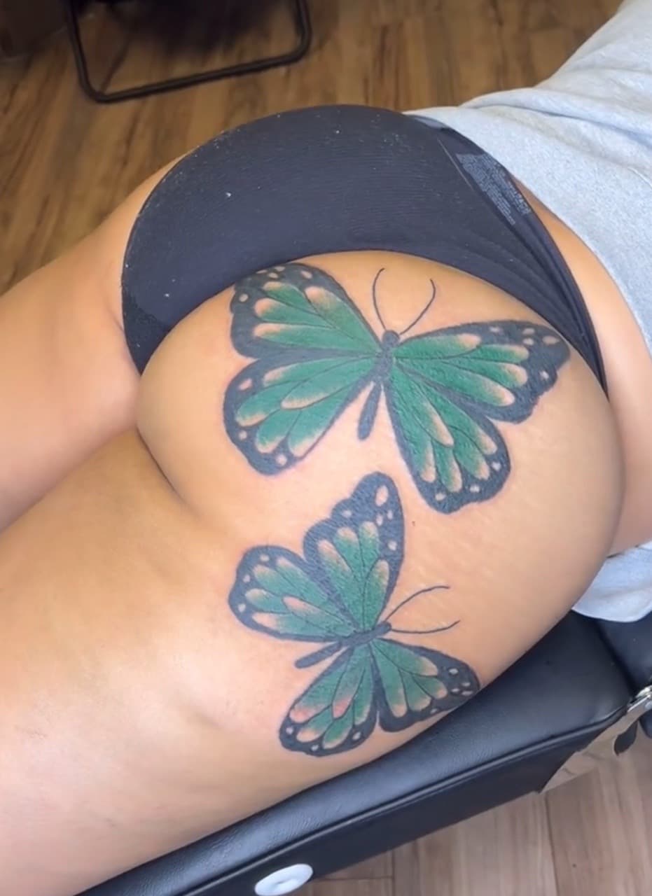 Color + Illustrative butterflies tattoo on Buttocks by Jay on TattMe