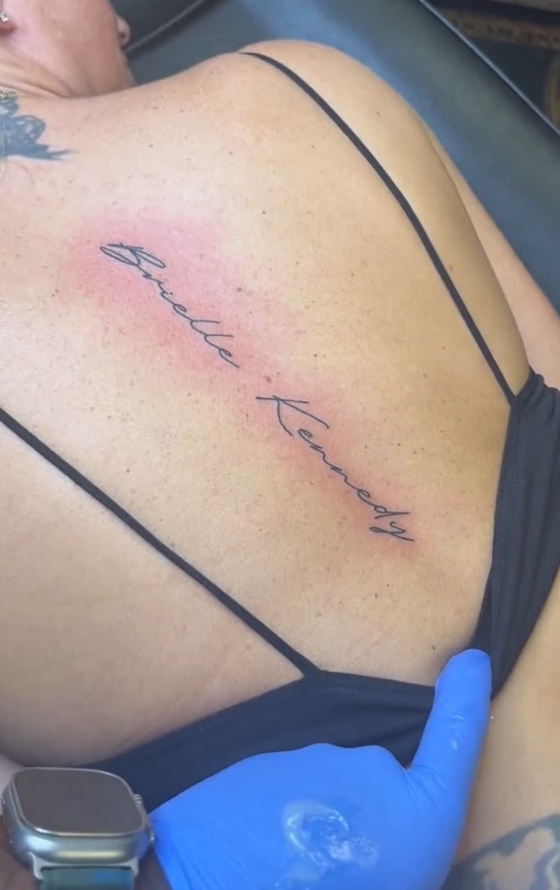 Lettering + Script names tattoo on Upper Back by Jay on TattMe