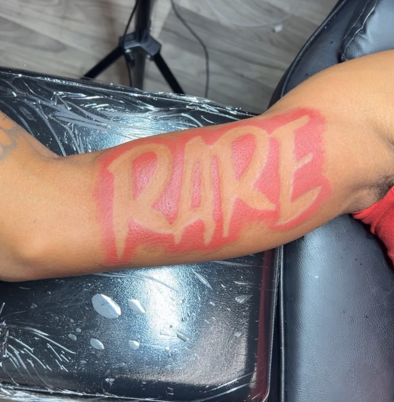 Lettering + Color word tattoo on Upper Arm by Jay on TattMe